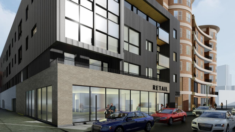 A rendering of a contemporary four-story mixed-use building.