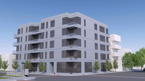 A massing model showing a five-story apartment building on a corner. 