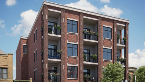 A four-level brick apartments building.
